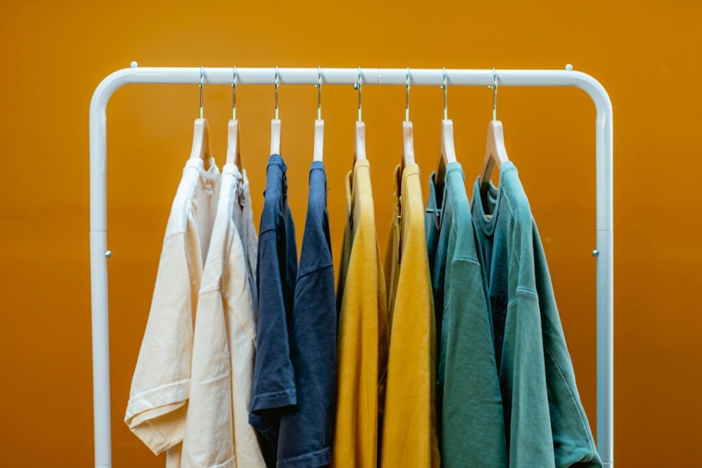 A rack of different clothes hanging together